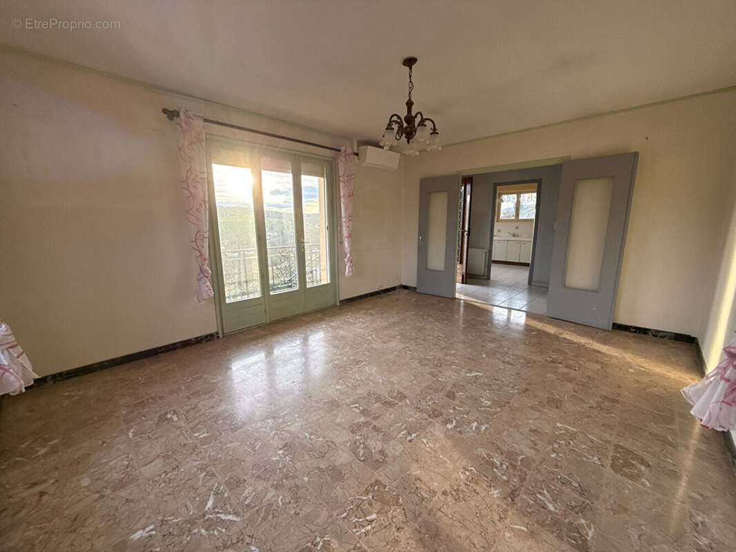 Maison à SOURCIEUX-LES-MINES