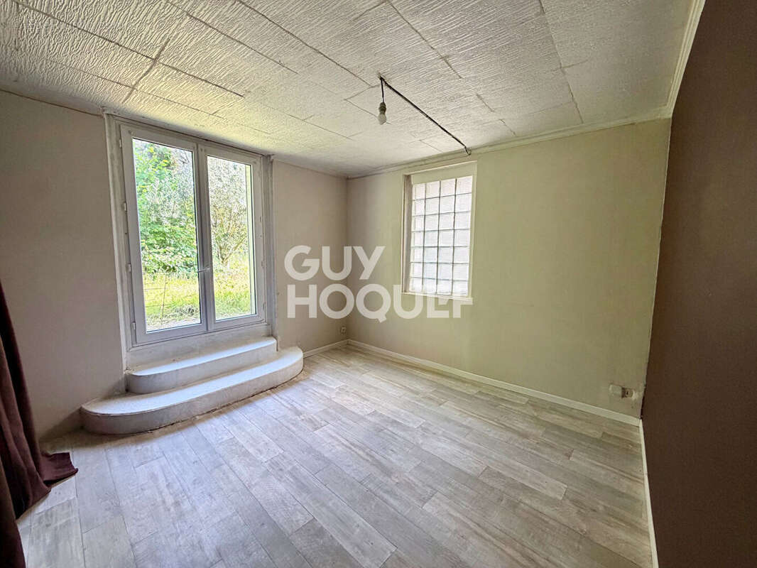 Maison  4 pièces de  130 m2 sur un terrain de 1168m²  avec une grange - photo 7