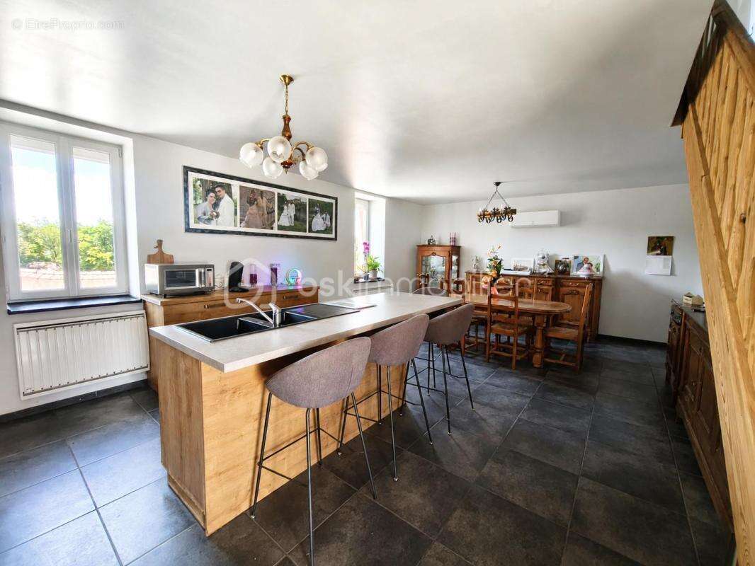 Propriété familiale où espace, confort et sérénité se rencontrent - photo 5