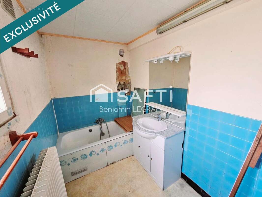 Maison 94 m² à Haspres  - photo 8