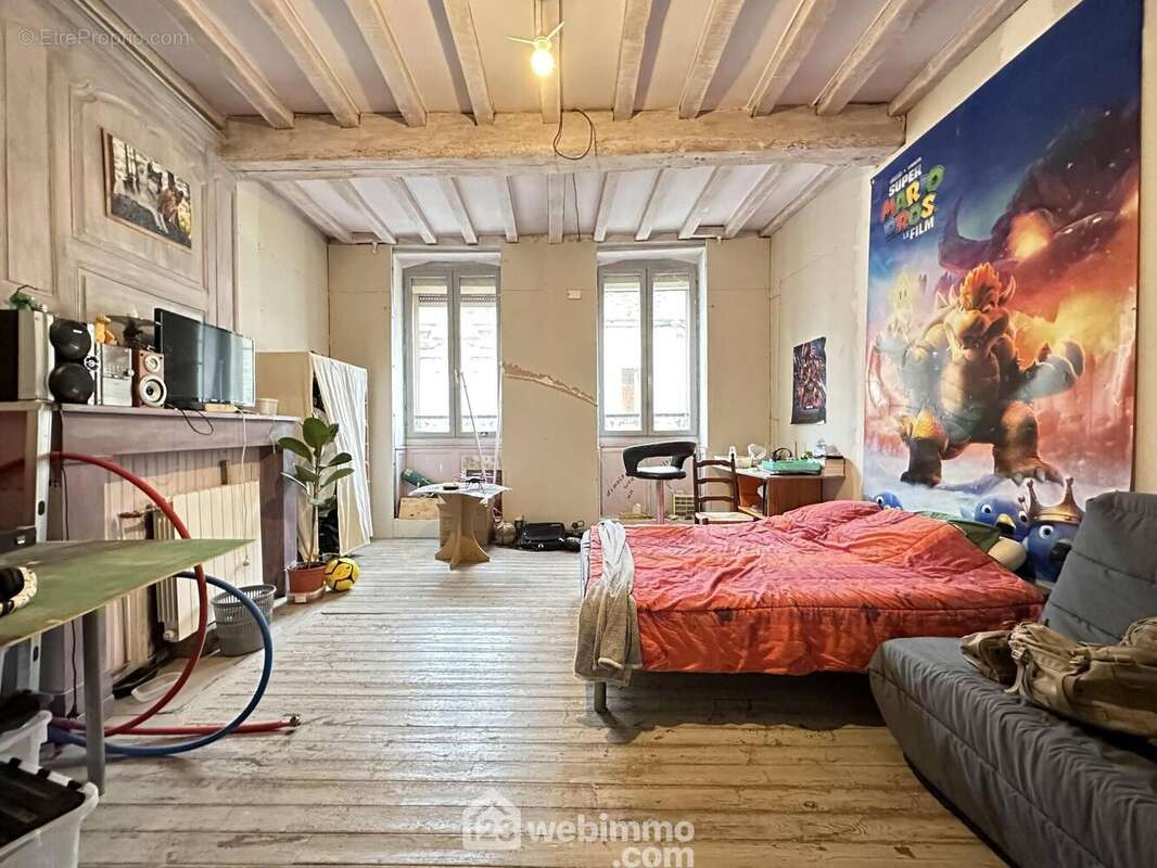 La première chambre de 22 m², les fenêtres sont en double vitrage - Maison à LIESSE-NOTRE-DAME