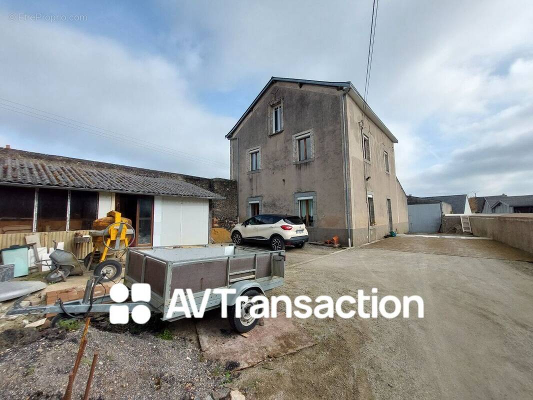 Maison à LOUVIGNE