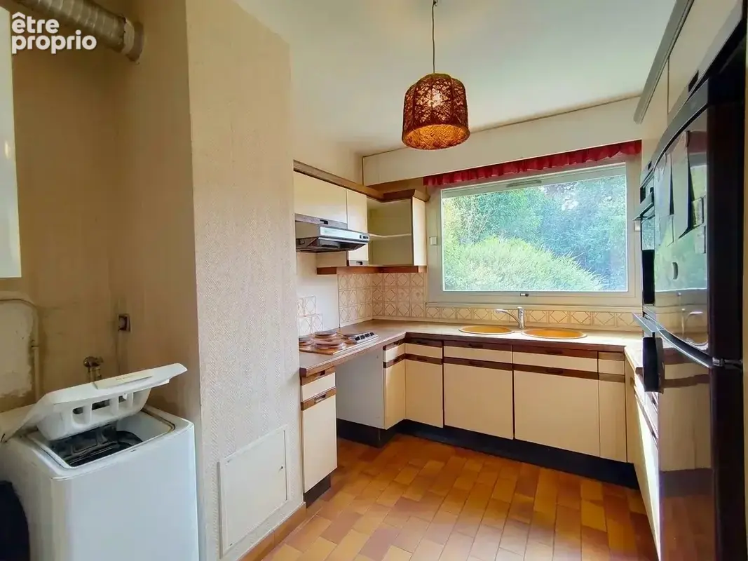 Appartement avec jardin privatif, caves et parking - photo 5