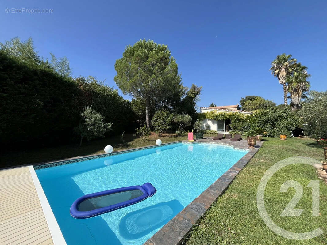 Maison 140 m² à Saint-Drezery  - photo 2