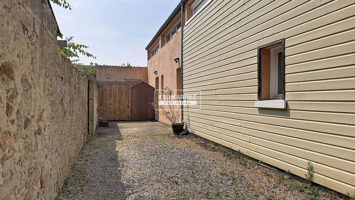 Maison familiale centre ville de Basse-Goulaine avec terrasse et deux places de stationnement - photo 15