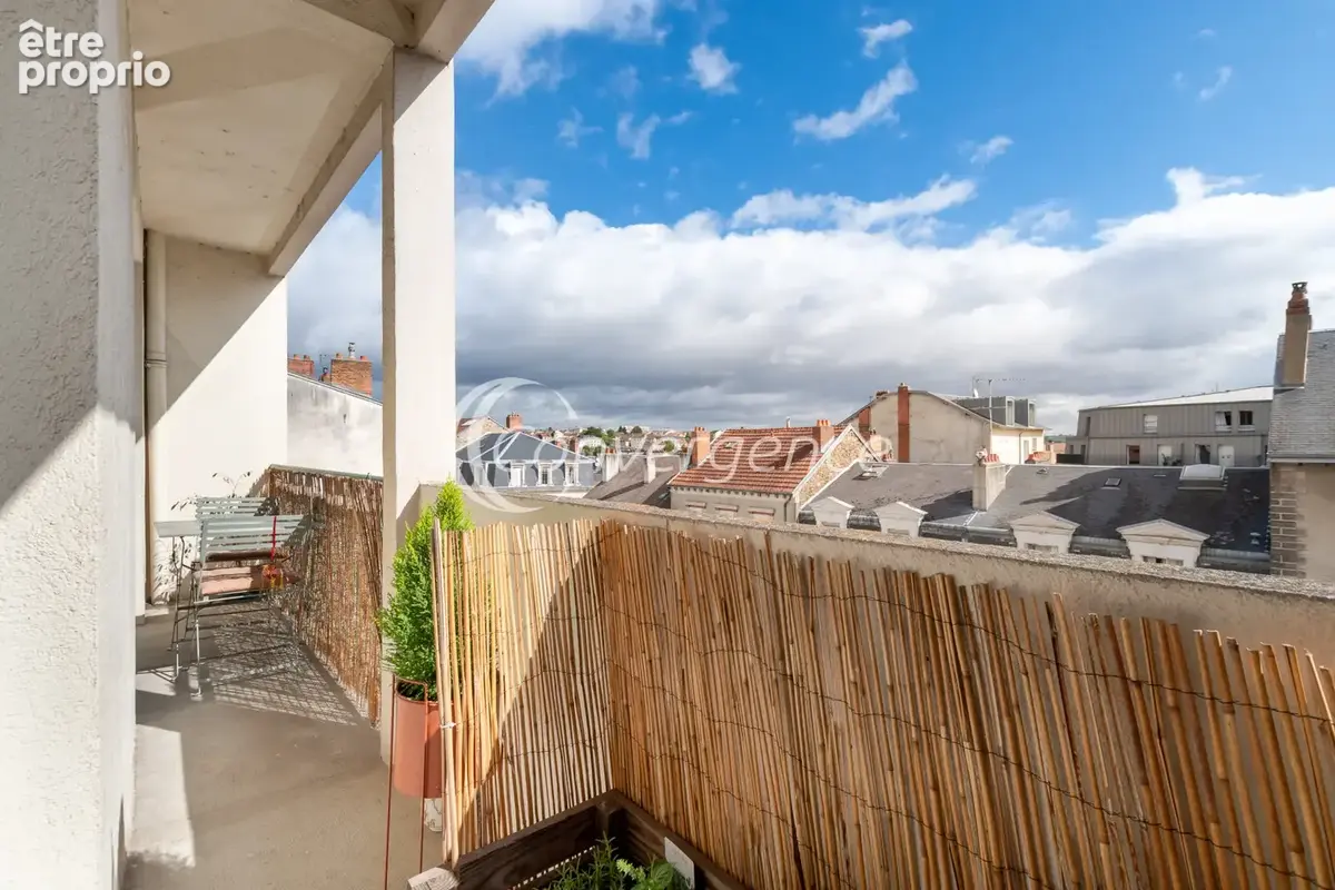 Appartement T5 avec double garage, balcon, ascenseur et cave - hypercentre - photo 12