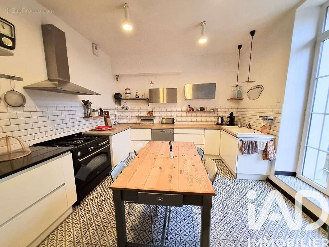 Photo 6 - Maison à SAINT-JULIEN-LES-ROSIERS