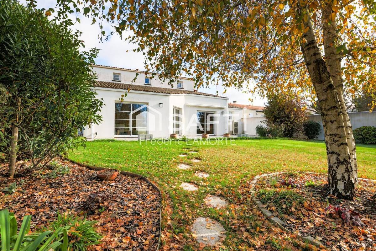 Photo 1 - Maison à PUILBOREAU