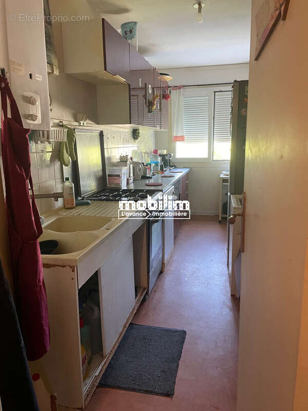 Cuisine semi-ouverte - Appartement à NANTES