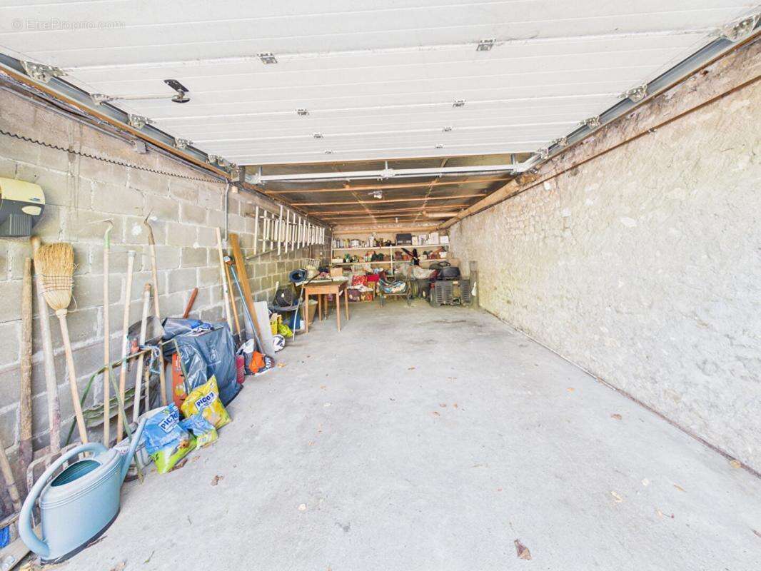 Maison de 179 m2 à Loudun , 5 chambres, grand jardin arboré, garage, vaste sous sol - photo 17