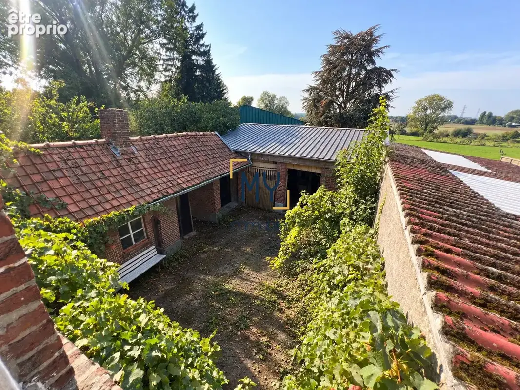 Maison avec vue sur champs / dégagé à rénover et grande propriété Maison et Terrains à vendre à Bondues 59910 MY Immobilier
