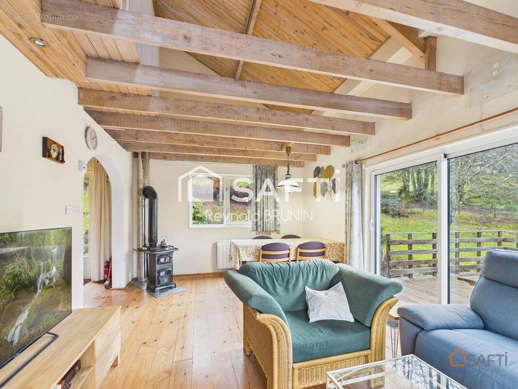 Photo 1 - Maison à LE SYNDICAT