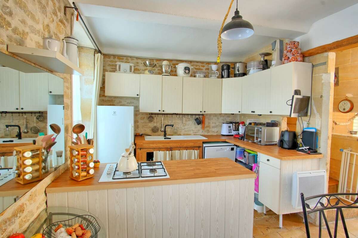 REVIERS - Maison en pierre 130m² avec 4 chambres & jardin - photo 4