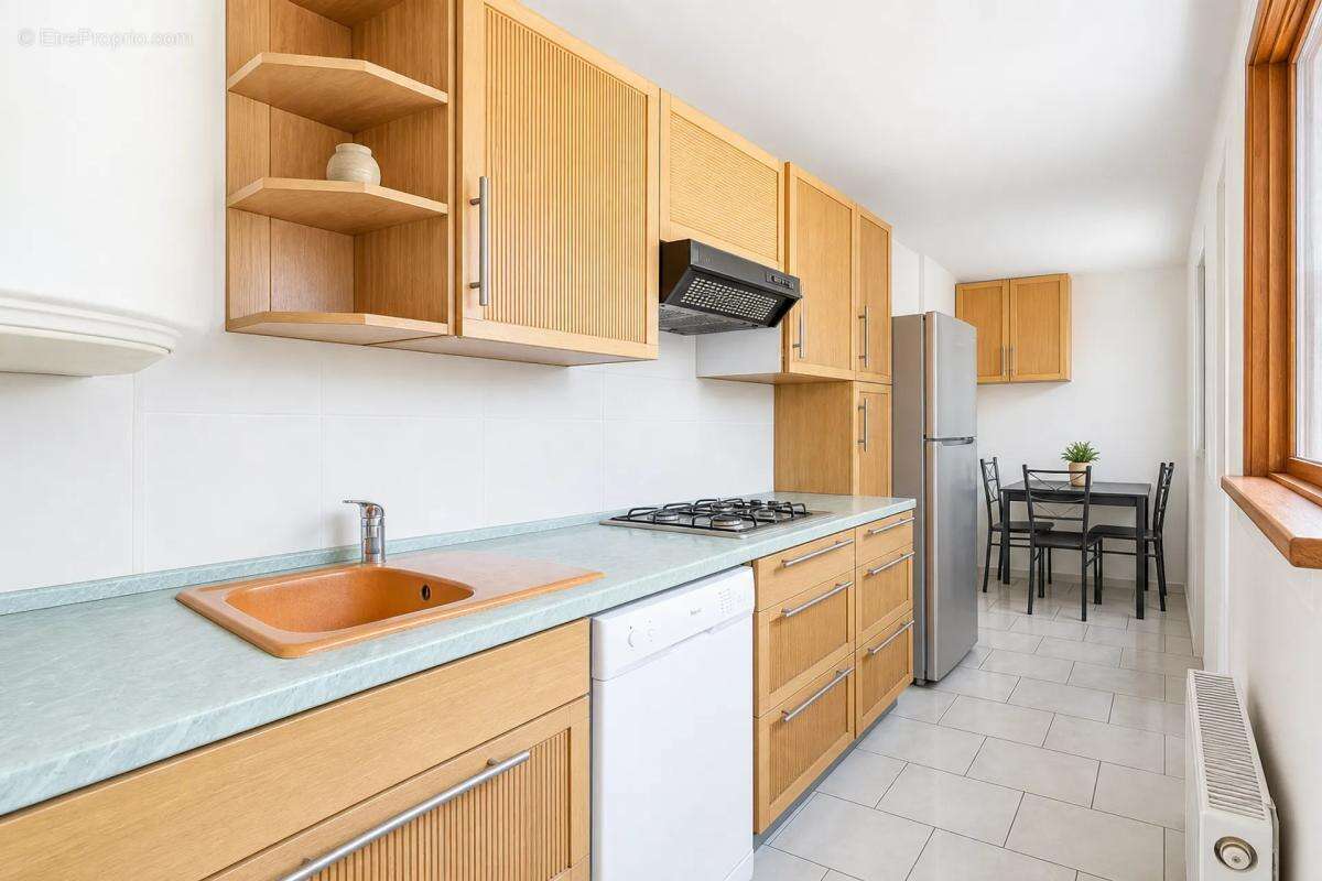 Maison de 5 pièces de 70 m² à Livry-Gargan - photo 4