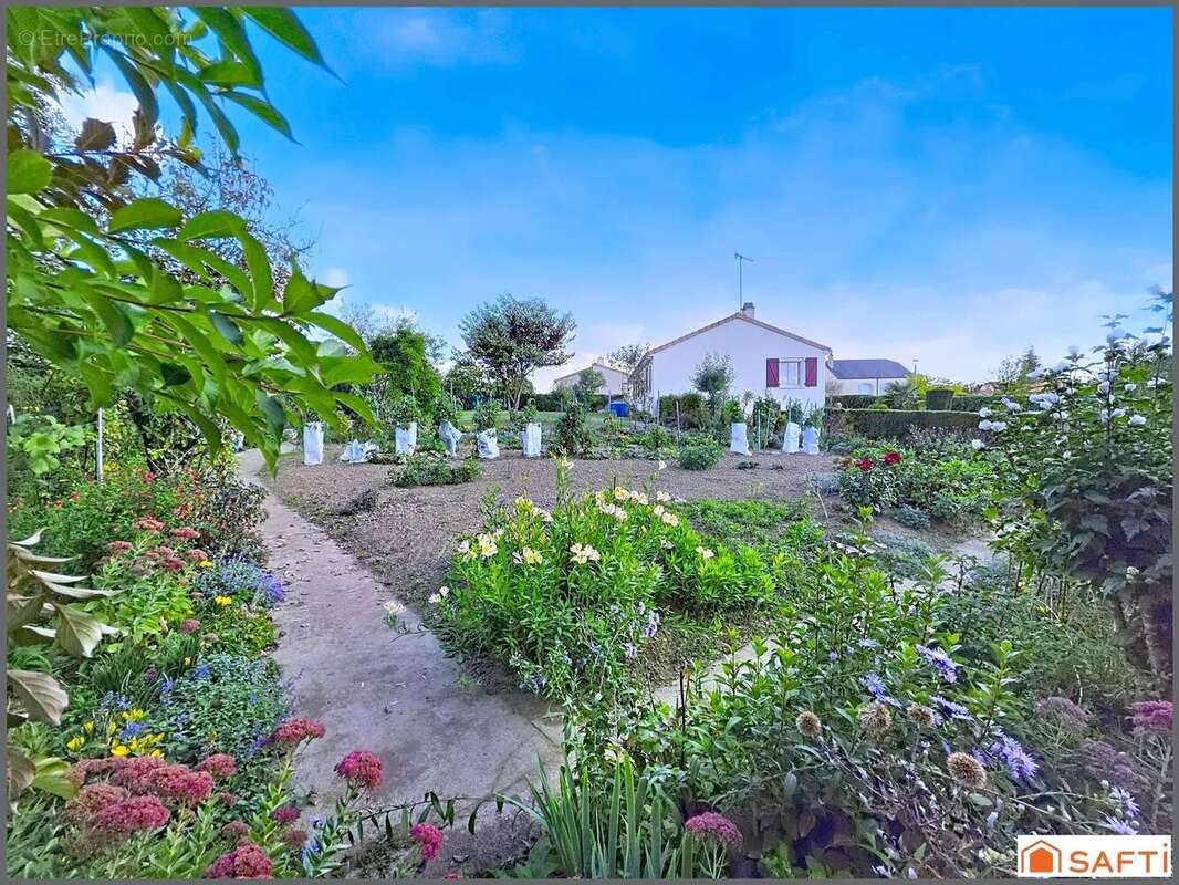 Photo 2 - Maison à ARGENTON-CHATEAU