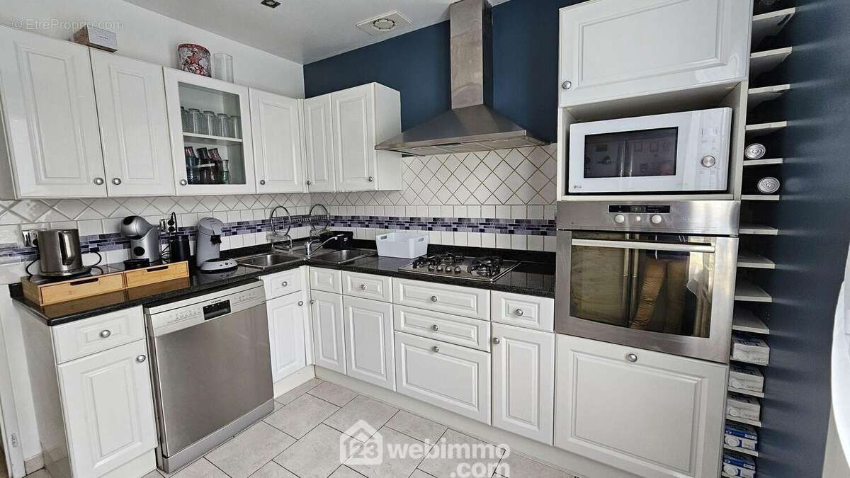 Une cuisine fonctionnelle. - Maison à MILLY-LA-FORET