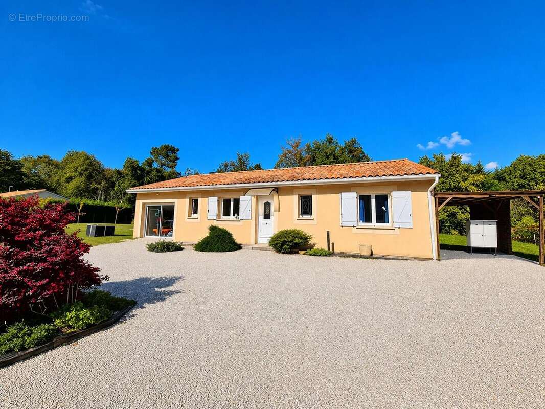 Photo 2 - Maison à SAINT-ASTIER