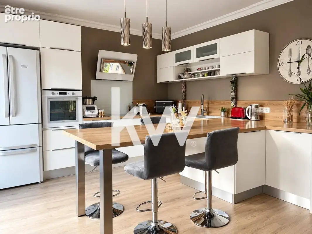 Appartement 4 pièces 103 m² à vendre à Saint-Etienne (42000) - photo 2