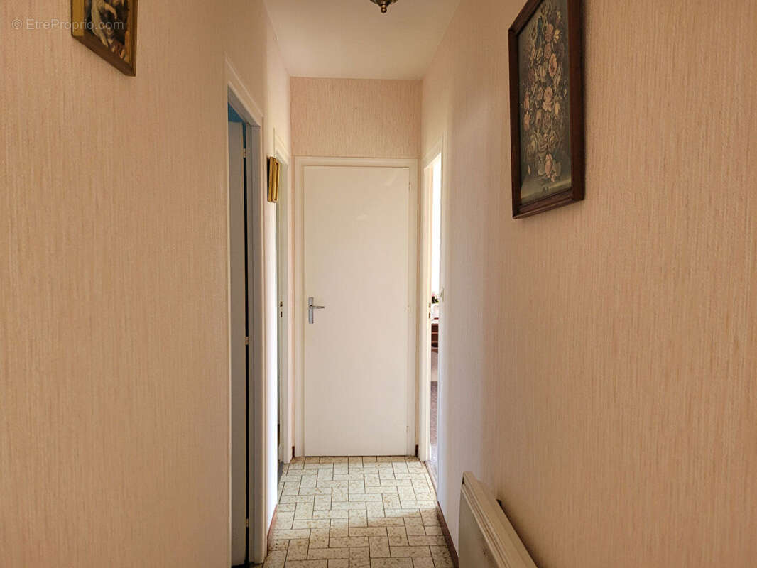 SOUS OFFRE - ECHILLAIS - Maison de plain-pied de  80 m² avec garage double et jardin clos - photo 5