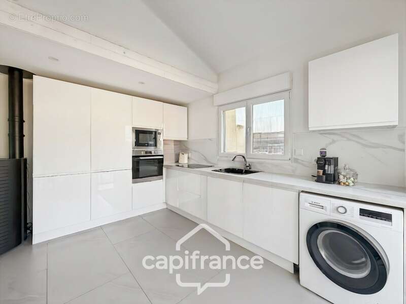 Maison plain-pied de 65,4m² à vendre à BEAUSEMBLANT (26) - photo 7
