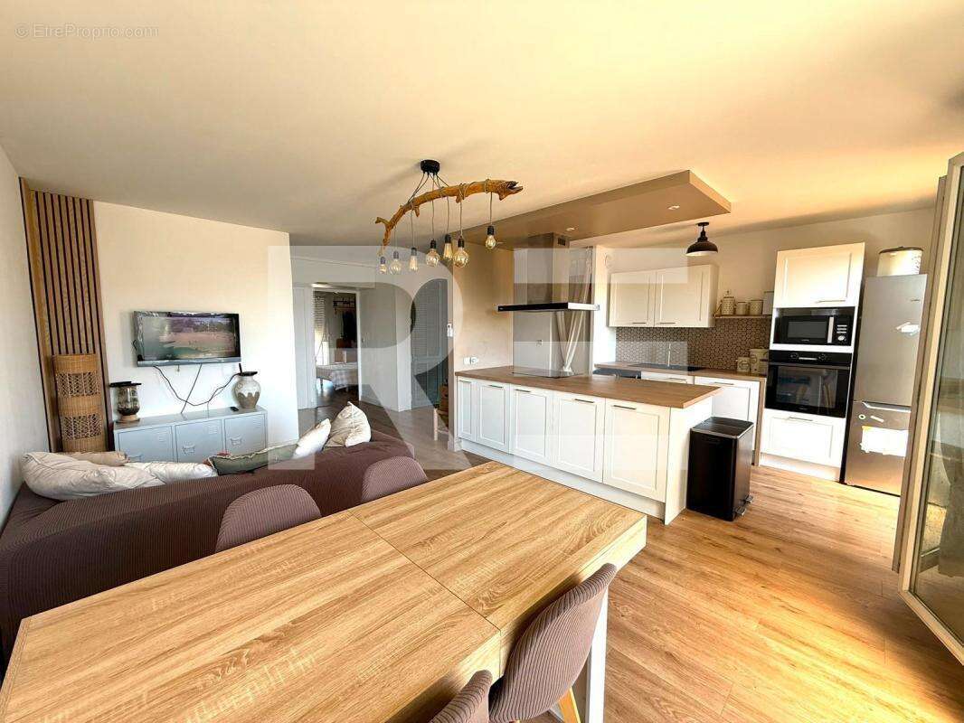 Appartement 65 m² 2 chambres terrasse garage et piscine - photo 3