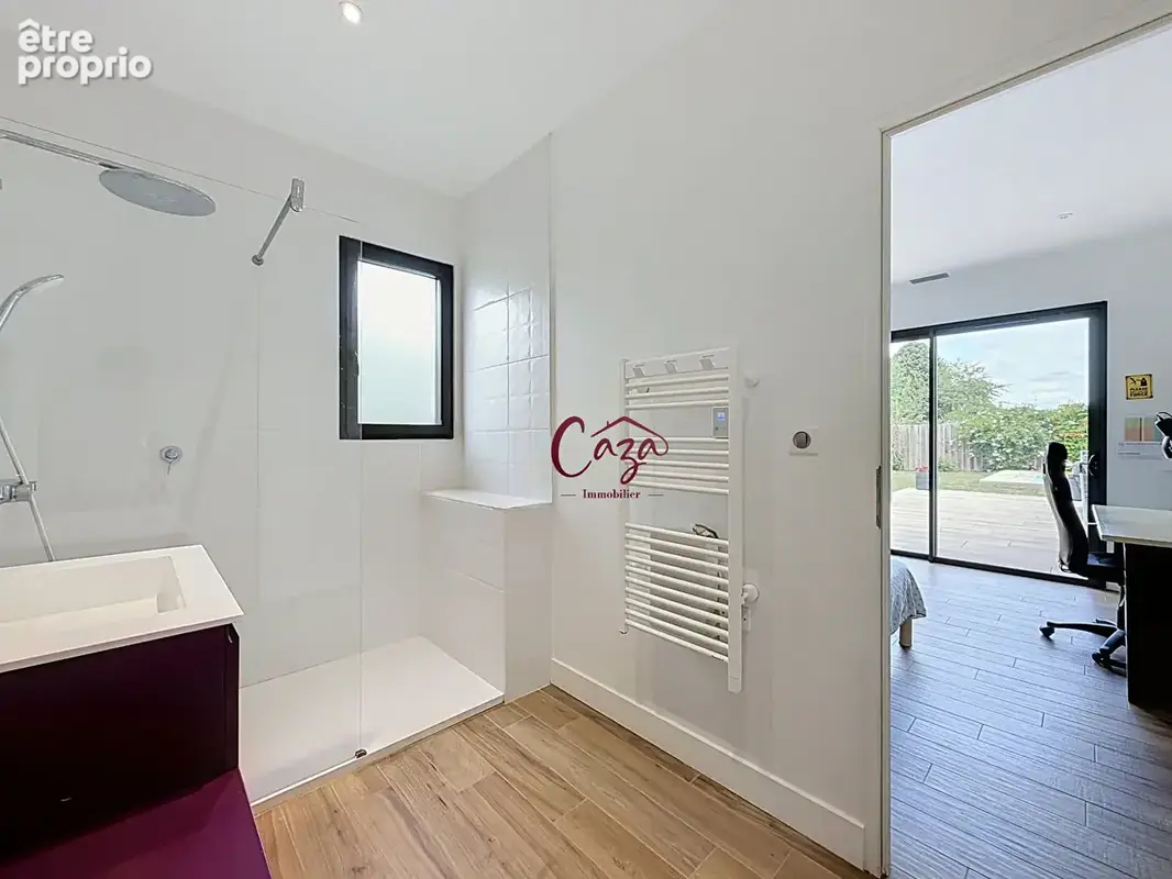 Villa comtemporaine de plain pied 183 m2 garage , piscine , 4 chambres - photo 10