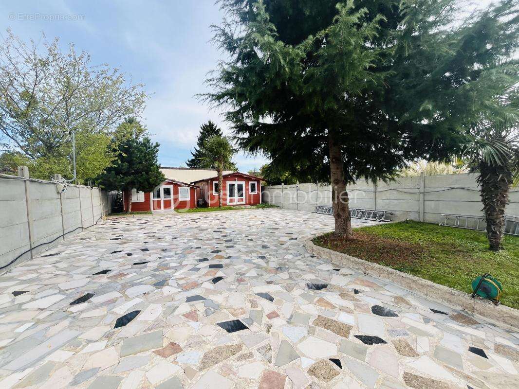 Maison élégante au cœur de la tranquillité et à proximité de toutes commodités - photo 2