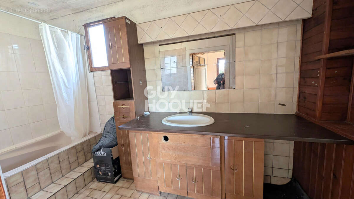 Maison à AUBERGENVILLE