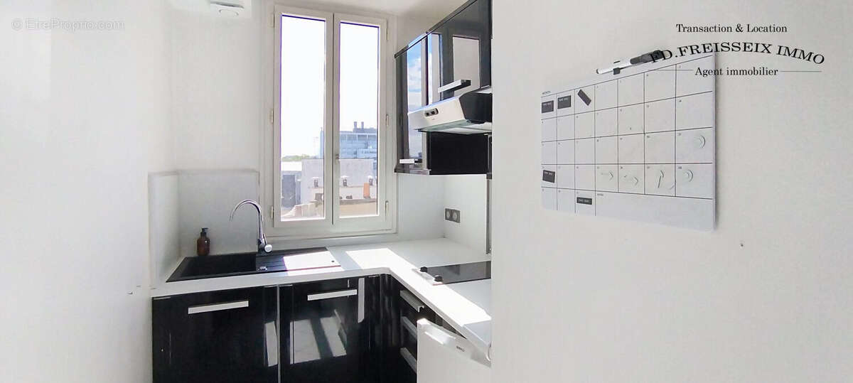 Cuisine aménagée - Appartement à PARIS-14E