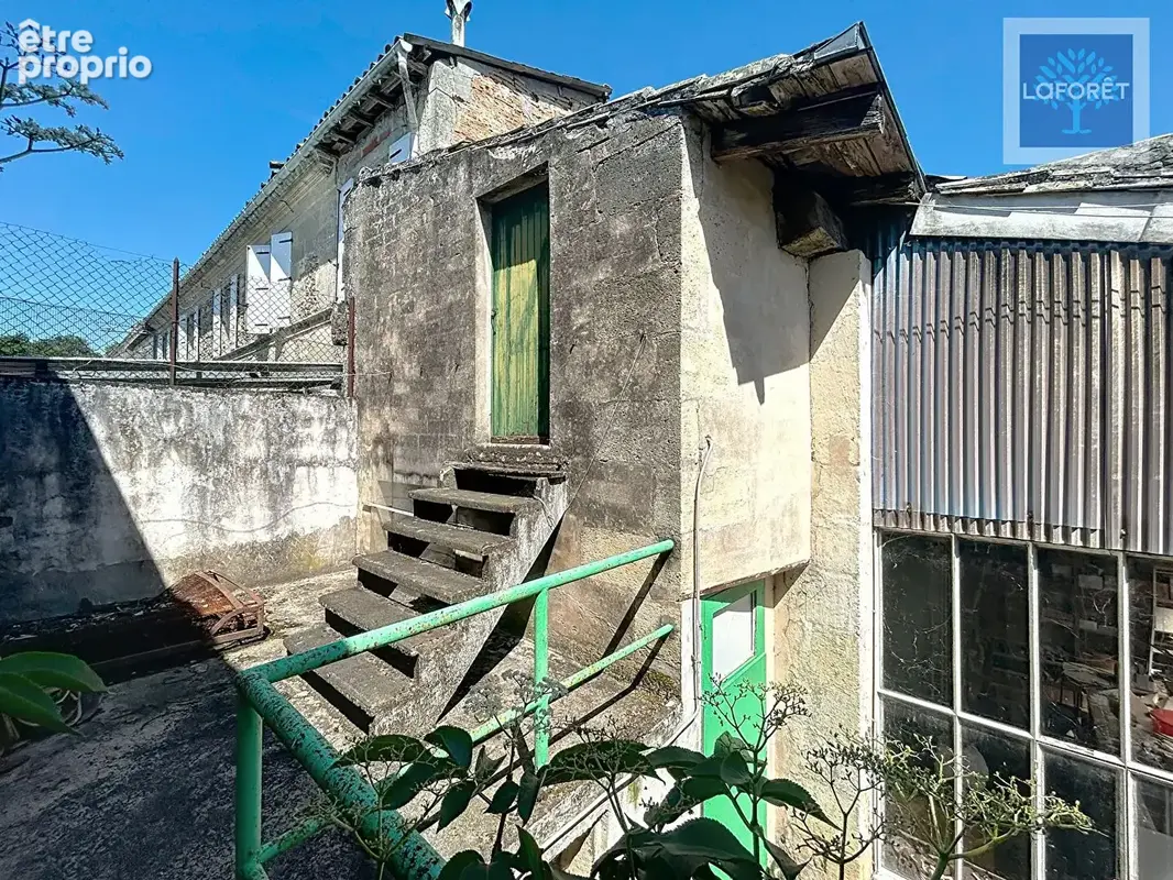 Immeuble avec local commercial et 5 chambres - photo 12