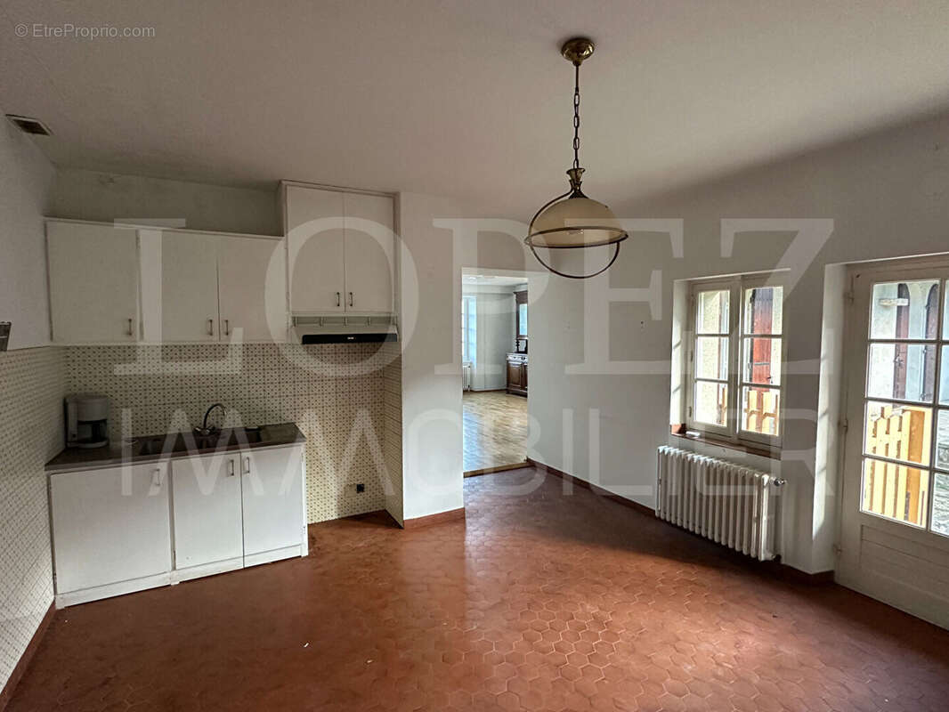 Maison à AIGUEFONDE