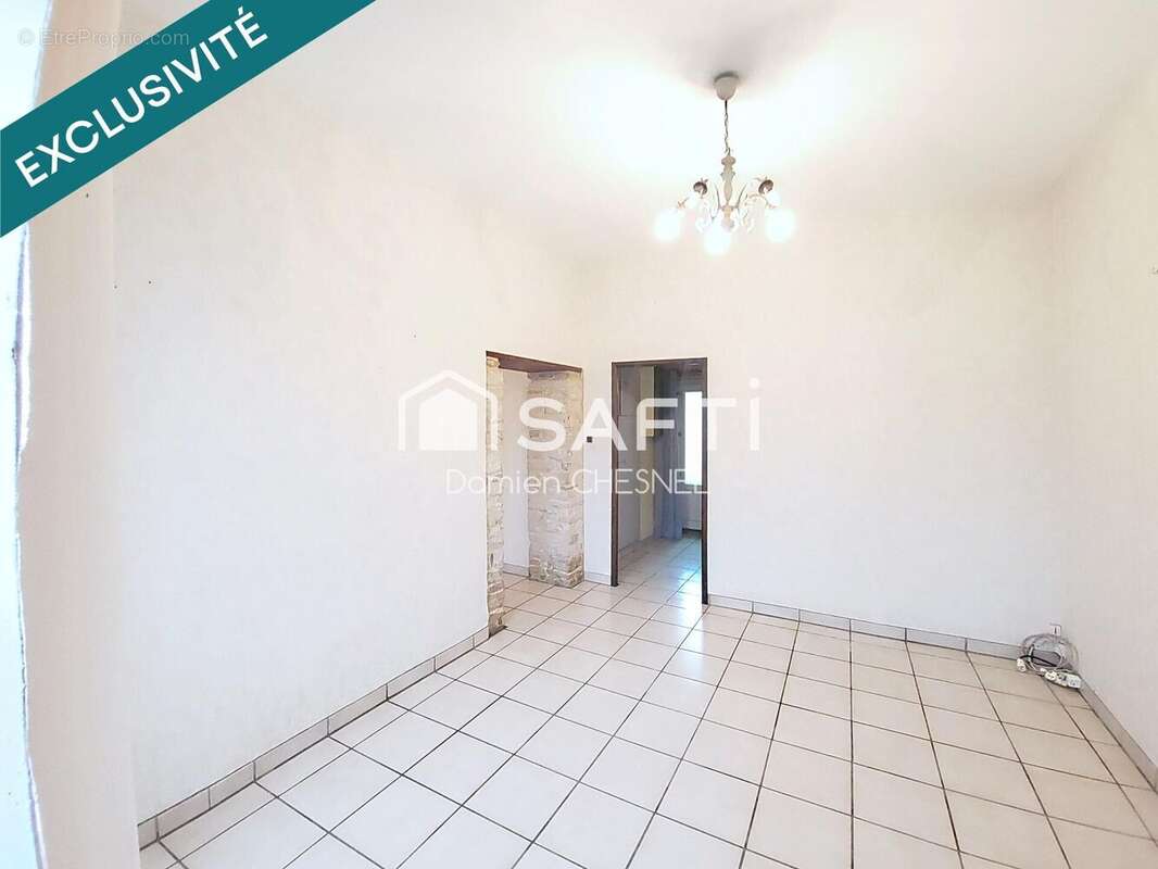 Photo 3 - Maison à BESSAIS-LE-FROMENTAL