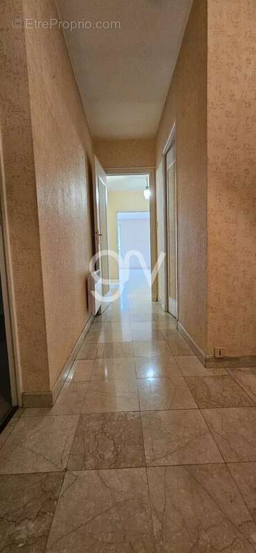 Appartement T4  117 m2 avec ascenseur _ à AURILLAC - photo 11