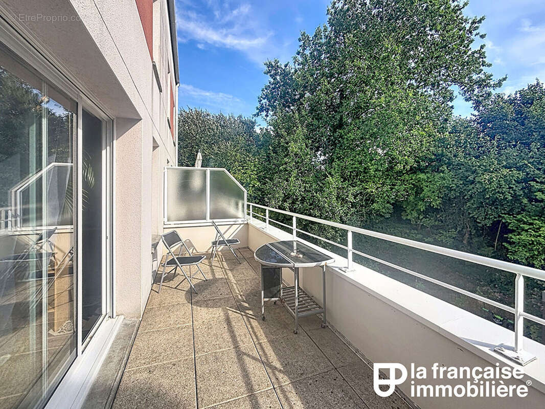 Appartement  duplex 82m²  -  3 chambres -  Garage fermé - Thorigné-Fouillard - photo 9