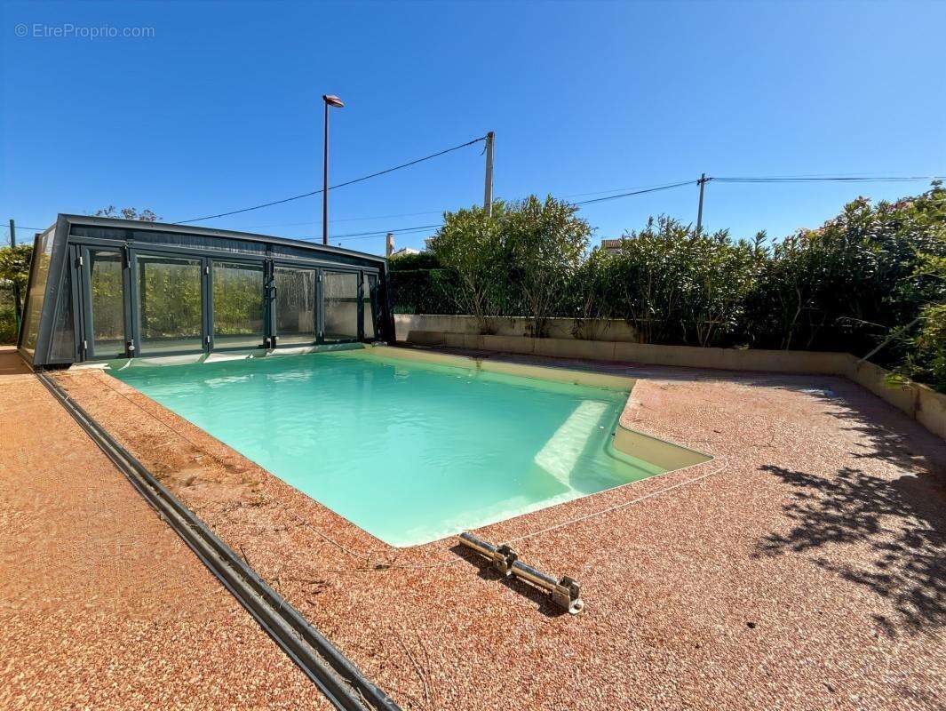 Maison plain-pied 111 m² – Accès PMR, moderne et lumineuse avec piscine - photo 2