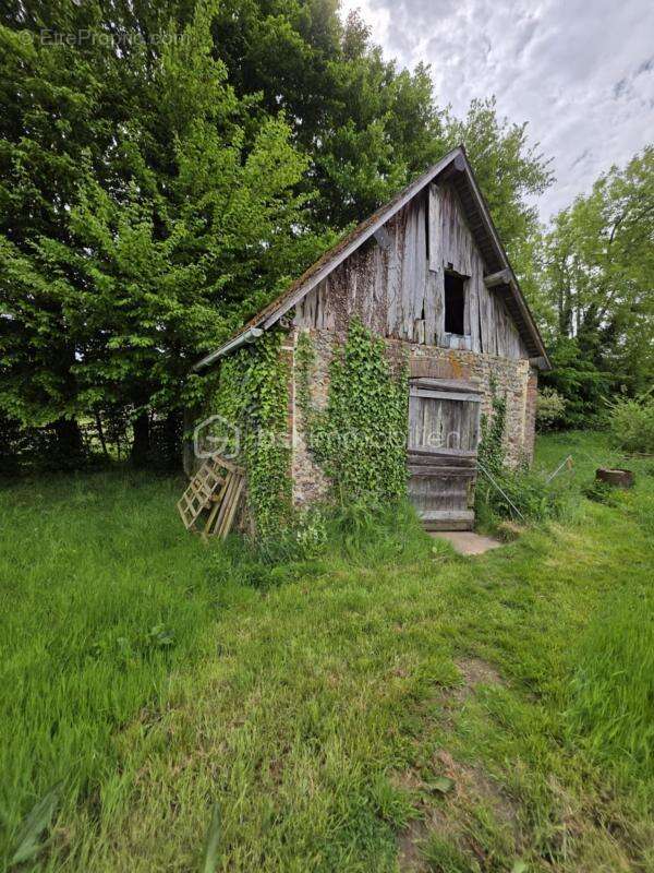 Bâtiment de stockage et terrain de 500m2 - photo 2