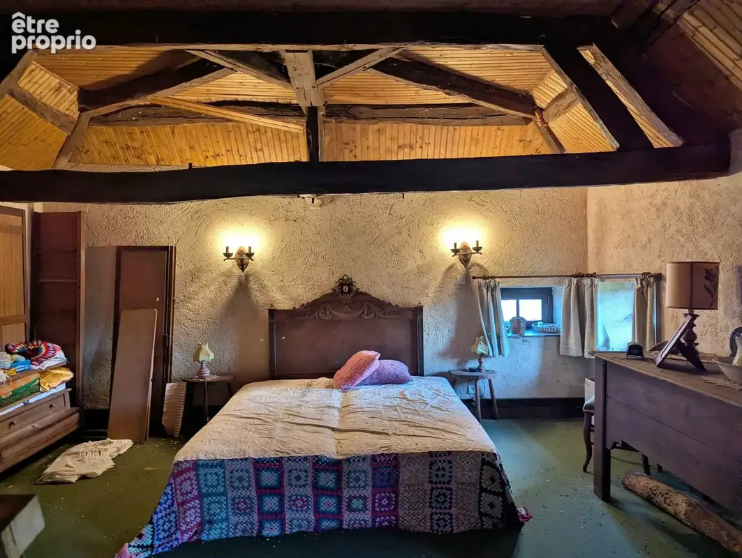 Chambre avec charpente apparente