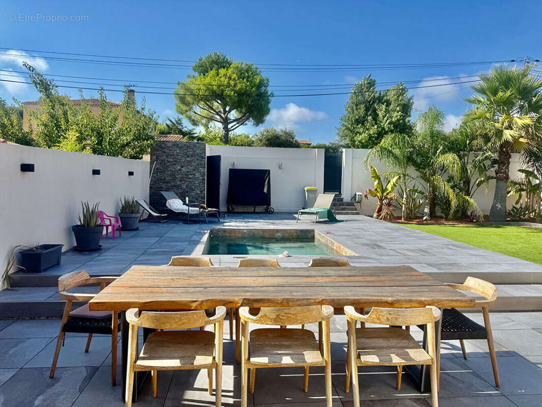 Maison de plain pied 100m2 terrain 538m2 garage et piscine - photo 5