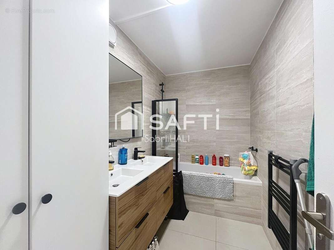 Photo 8 - Appartement à COURBEVOIE