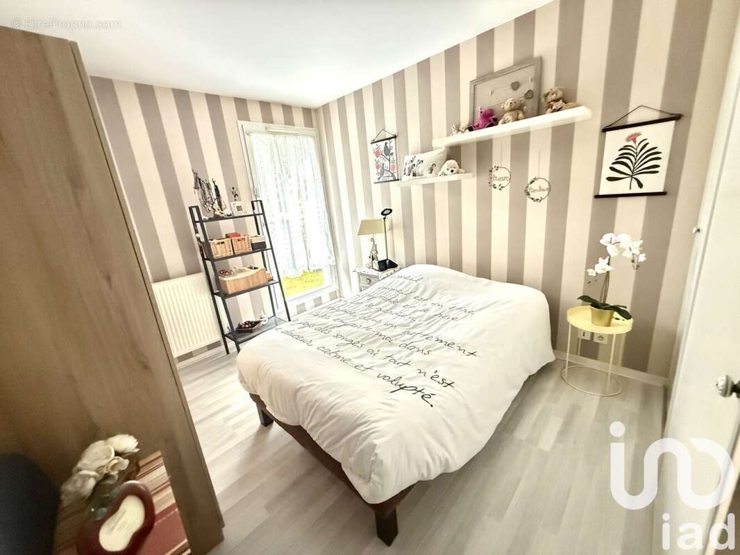 Photo 8 - Appartement à SAINTE-GENEVIEVE-DES-BOIS