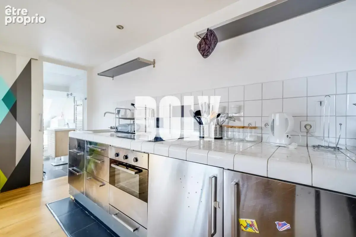 Doly - rue du faubourg saint-martin - 4 pieces - photo 6