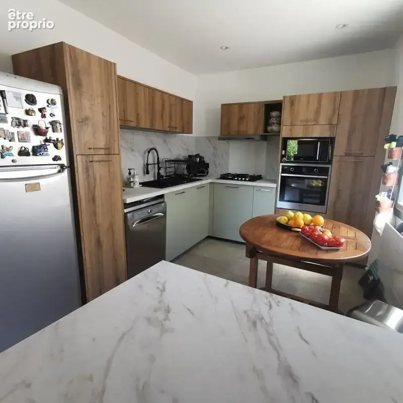 Maison de 132 m² avec jardin - photo 5