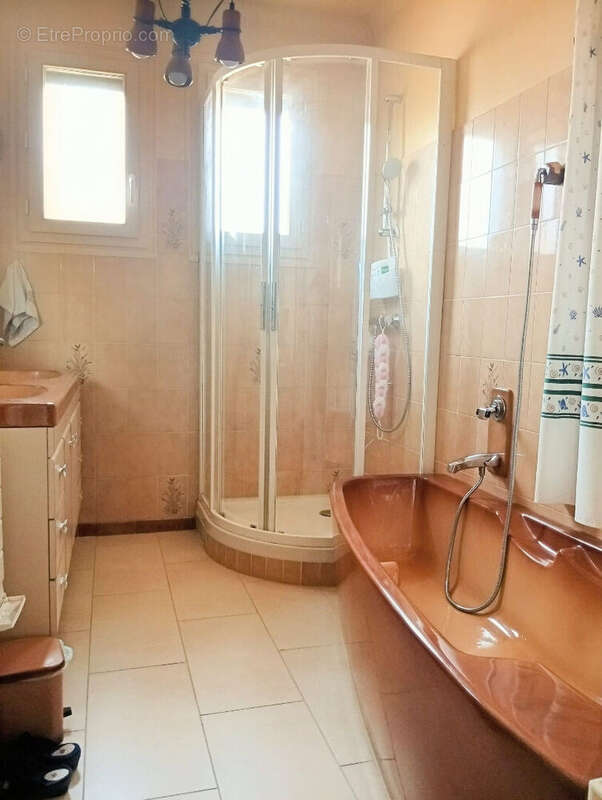 Secteur recherché des bas Coteaux ? Maison semi plain-pied de 95 m² avec 3 chambres, double garage et jardin - photo 7
