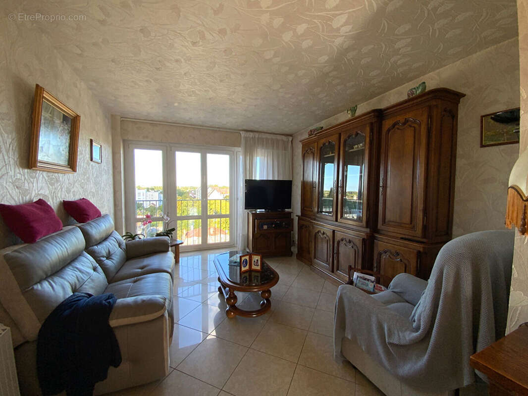 A deux pas du centre, appartment t4 traversant de 74m² - photo 4