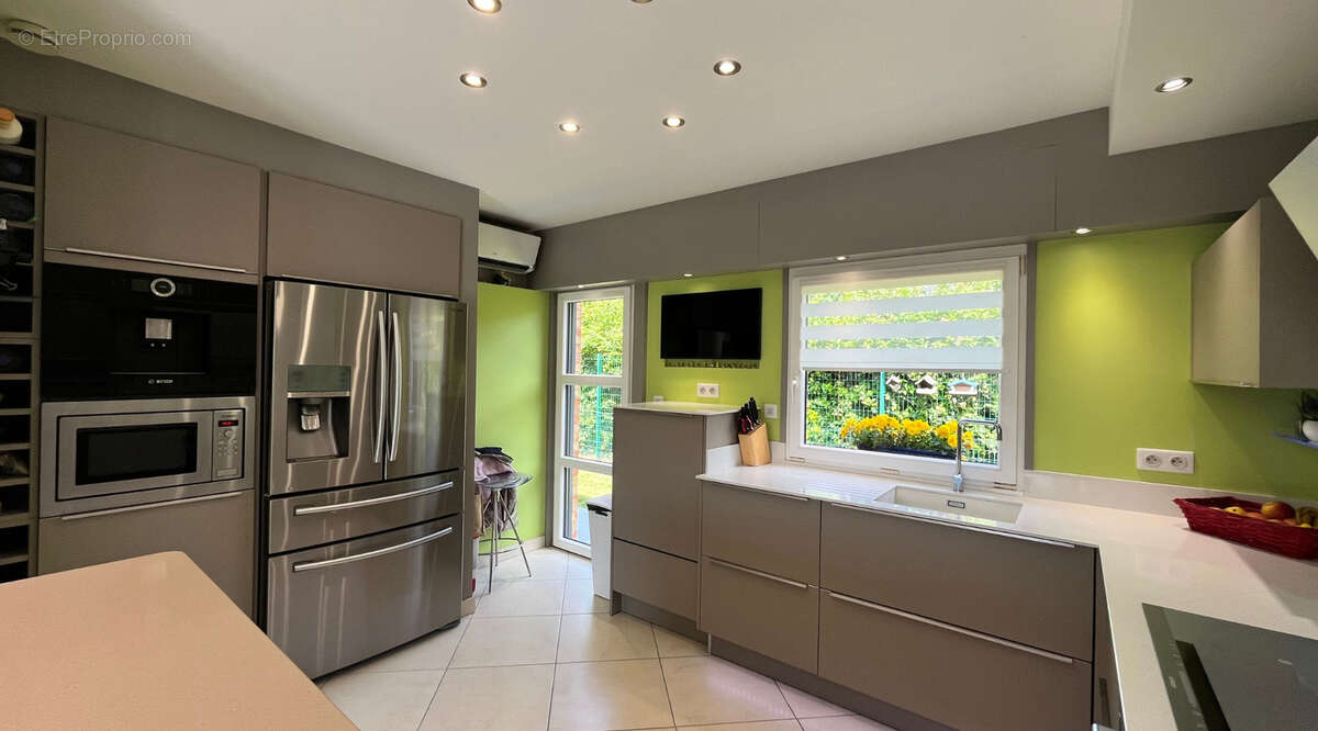 Plain-pied 4 chambres 120m² - photo 11