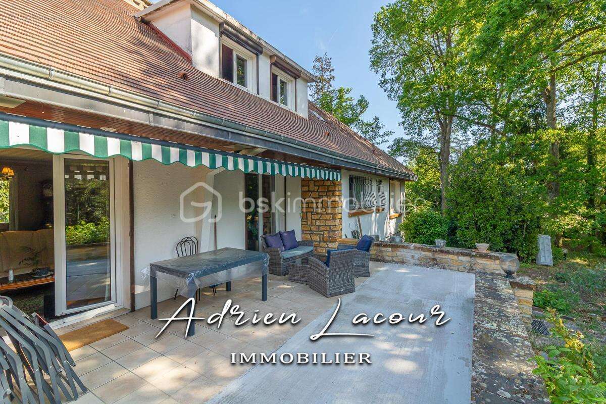 Jolie maison sur sous-sol avec son parc arboré - photo 4