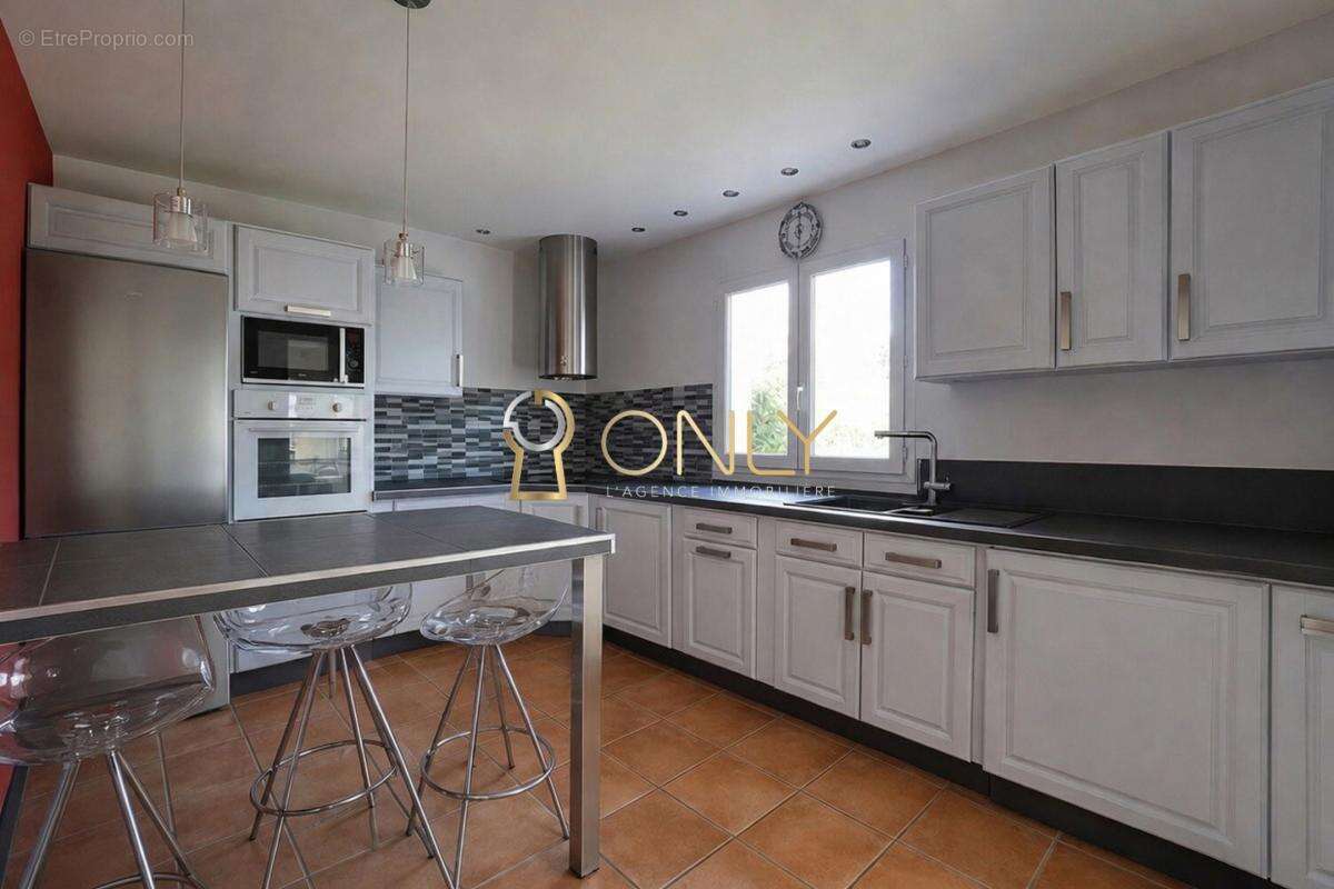 Savigneux - maison - 5 chambres - photo 11