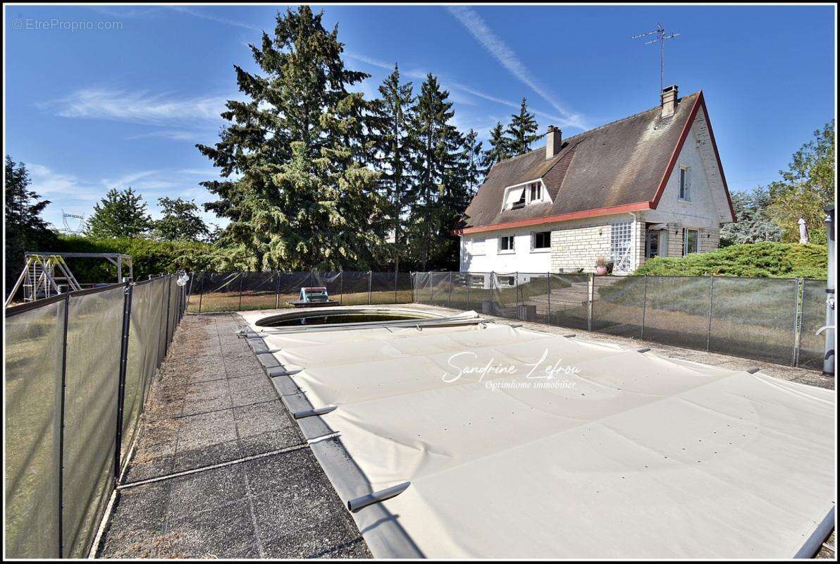 La Chaussée-d'Ivry – Maison familiale avec piscine, sous-sol total et terrain de 2 788 m² - photo 12