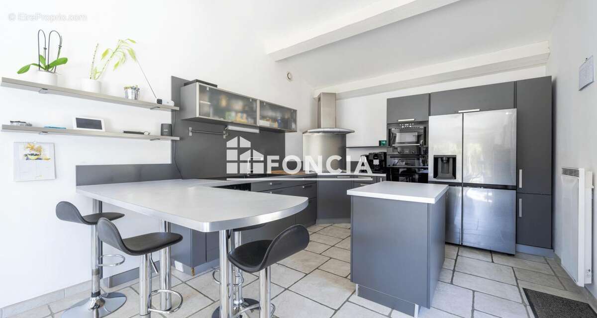 Maison à ARPAILLARGUES-ET-AUREILLAC