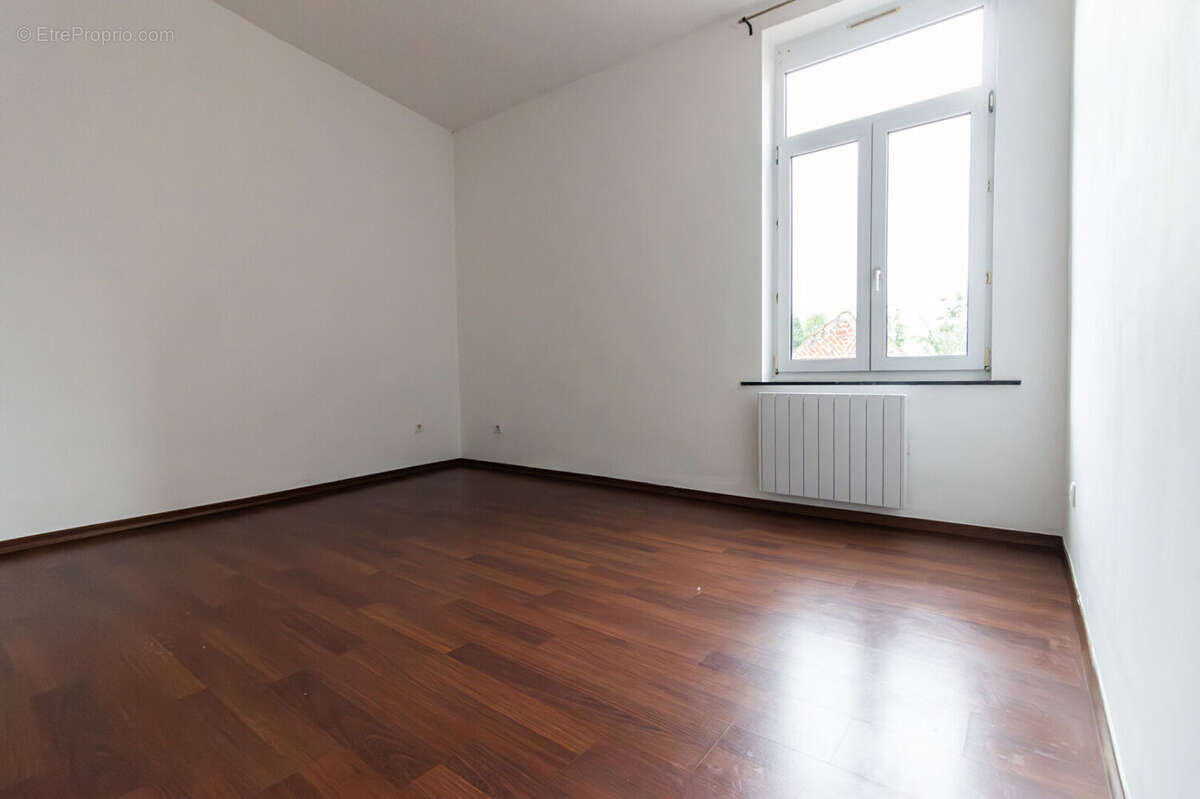 Appartement 2 pièces de 49 m²  à Ronchin - photo 5